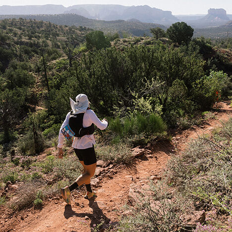 Sally McCrae Running down a trail
